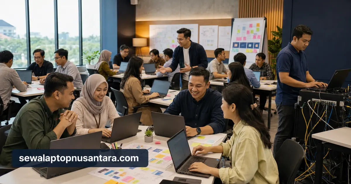 Peserta workshop menggunakan laptop sewaan dalam sesi praktis dengan teknisi siaga